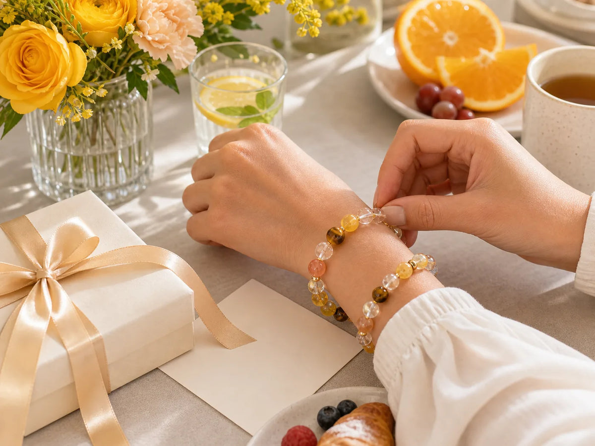Joy intention crystal bracelets worn in a bright everyday styling scene