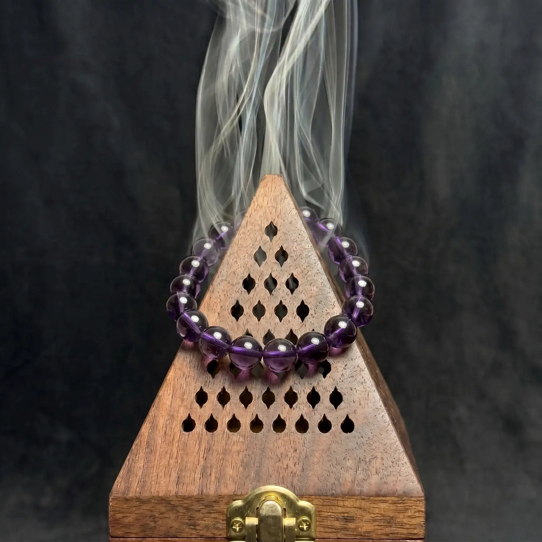 8mm Natural Amethyst Bracelet - amethyst cleansing ritual smudge hover image