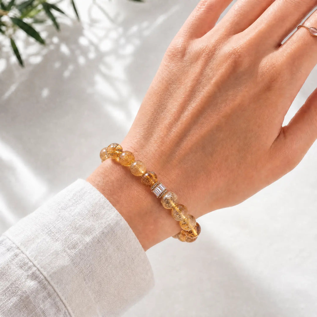 12mm Citrine & Rutilated Quartz Bracelet - 04 rutilated quartz crystal lifestyle wearing style