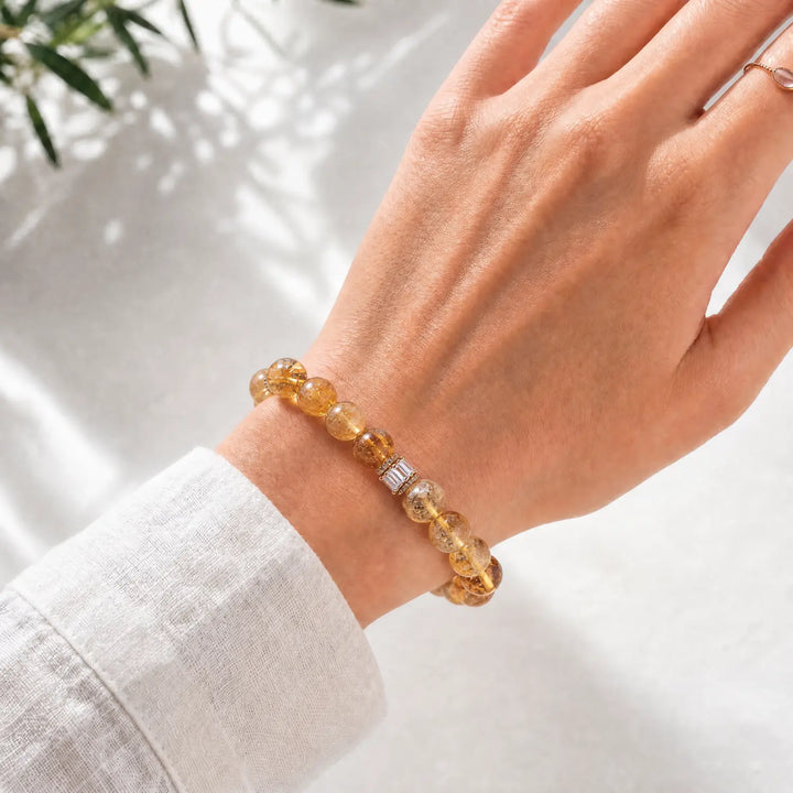 12mm Citrine & Rutilated Quartz Bracelet - 04 rutilated quartz crystal lifestyle wearing style