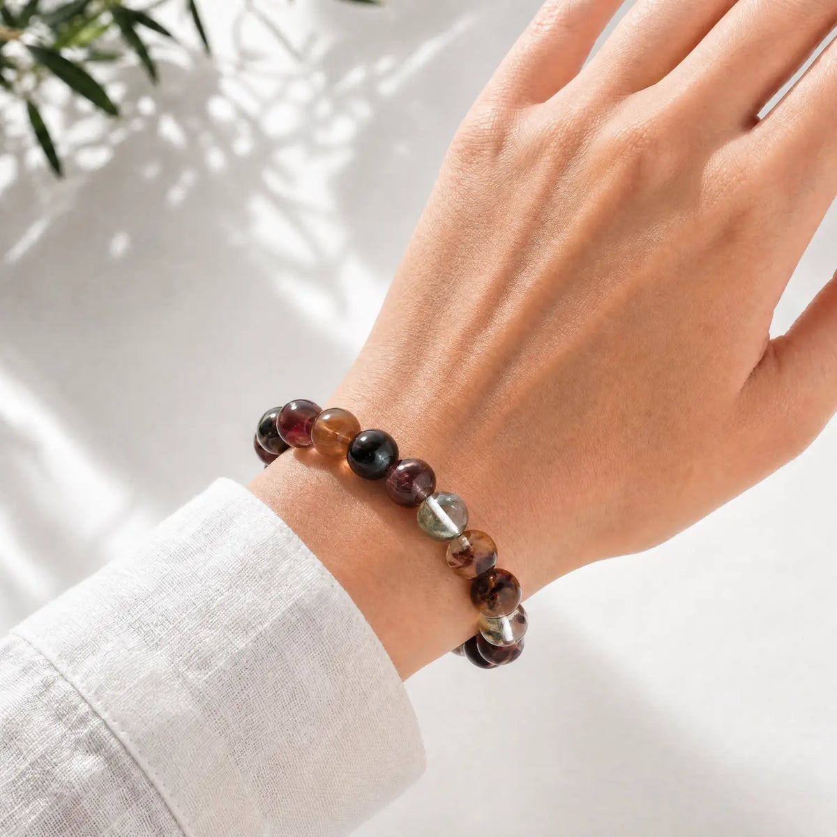 10mm Natural Phantom Quartz Bracelet - rutilated quartz crystal lifestyle wearing style