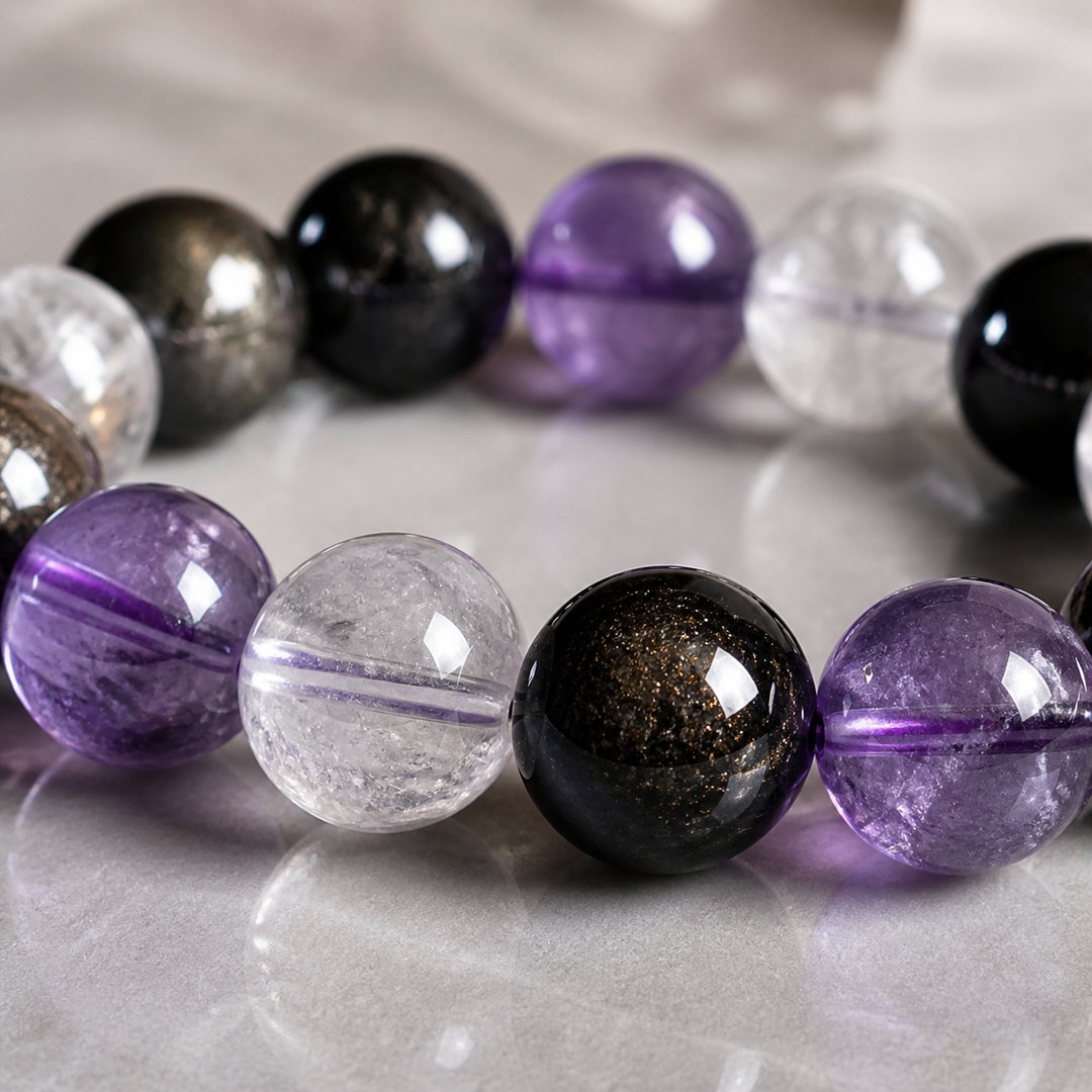 Macro bead detail for 12mm Multi-Stone Crystal Bracelet with Amethyst, Clear Quartz, Gold Obsidian | QZENI crystal bracelet