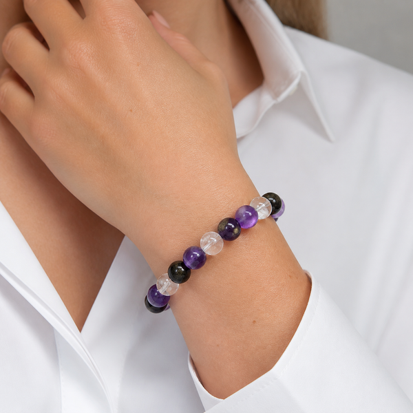 Wearing close-up on American woman wrist for 12mm Multi-Stone Crystal Bracelet with Amethyst, Clear Quartz, Gold Obsidian | QZENI crystal bracelet